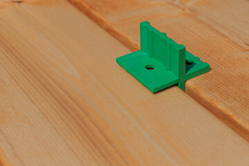 Terrace construction, use of bottom spacers. Deck board gap walks, tools.