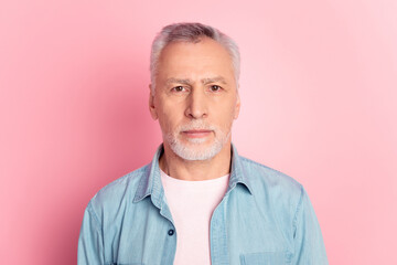 Fototapeta premium Photo of mature man serious intelligent wear casual outfit marketer isolated over pink color background