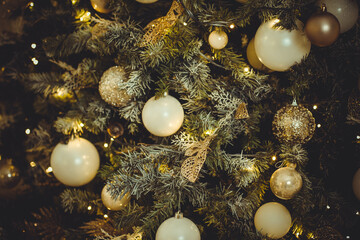 Obraz na płótnie Canvas Christmas background with ornaments, golden Christmas ornaments