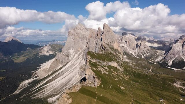 
Drone view time-lapse at mountain Seceda in Dolomites, Italy. Picturesque Sky over the Odle Group Mountains. Val Gardena.