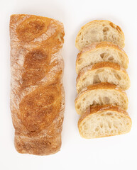 crusty baguette isolated on white background, top view