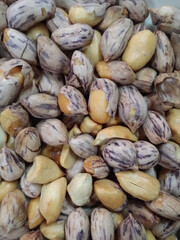 close up of a pile of peanuts
