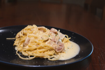 Carbonara on black plate