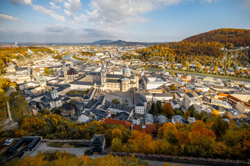Fototapeta na wymiar Top view on Salzburg city from castle hill on a sunny autumn day in Austria