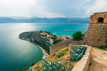 Panoramic view the fortress of Palamidi, scenery of Bourtzi castle at Nafplio town Greece, Peloponnese - obrazy, fototapety, plakaty