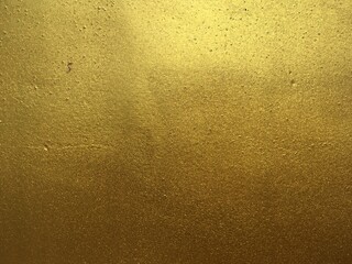 Golden color surface wall texture background 