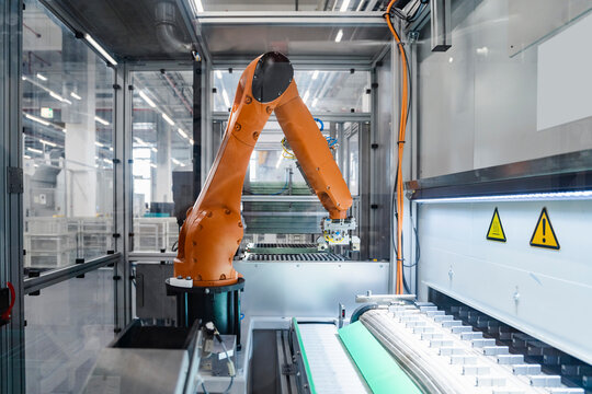 Robotic arm working at industry