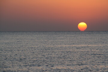 orange circle on blue surface