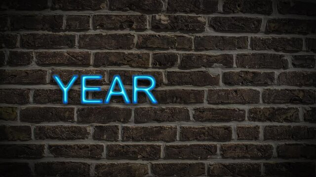 Detailansicht einer Leuchtreklame an einer Mauer mit der Aufschrift Happy New Year 2022