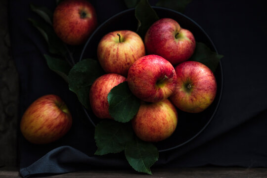 Studio shot of bowl of fresh Gala apples
