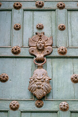 Antique Knocker on Turquoise Green Colored Wooden Door of Cusco Cathedral, Historic Center of Cuzco, Peru