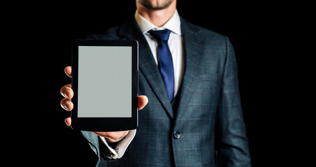 Ebook template. Digital book, library reader tablet in business man hand. Online learning, home school concept.