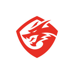 Angry dragon head and shield, badge, emblem vector icon logo
