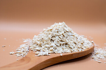 Oat bran in wooden spoon