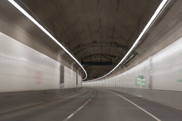 gray road tunnel. city underground bridge. grey tunnel corridor. motion car