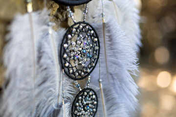 Handmade dream catcher with feathers threads and beads rope hanging