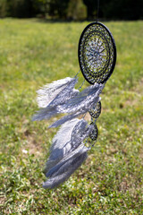 Handmade dream catcher with feathers threads and beads rope hanging