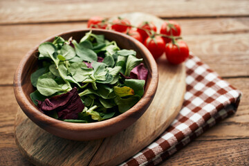 salad plate vegetables fresh ingredients wooden table kitchen