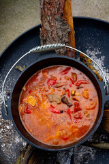 Kettle goulash is prepared over an open fire!