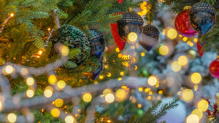 New Year decoration abstract background with ornamental stars, shiny glitters and bokeh light bubbles. Selective focus.