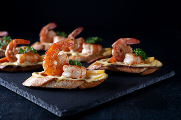 Bruschetta with shrimps, mayonnaise and micro greens. Healthy eating concept