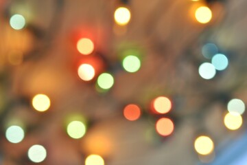 new year festive background. blurry colored lights garland