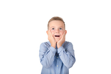 Surprised schoolboy, mouth wide open, stunned by shocking news, on a white isolated background.Copy space,banner,advertisement.