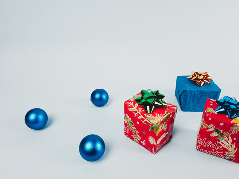Christmas gifts and three balls