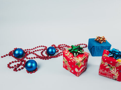 Christmas gifts with decorations and three balls