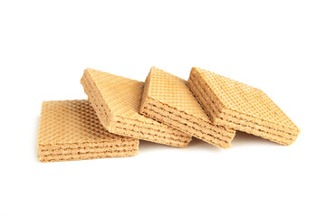 Square chocolate wafer biscuits isolated on white background.