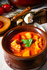Hungarian goulash soup in a cauldron or pot