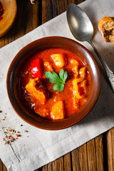 Hungarian goulash soup in a cauldron or pot