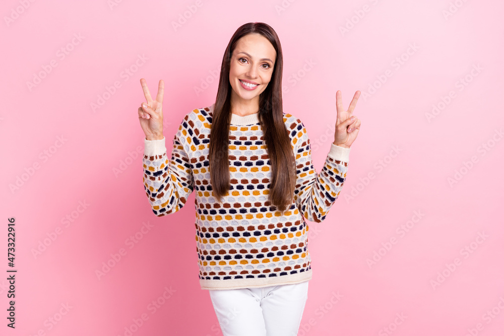 Sticker photo of funky adorable mature lady dressed print pullover showing two v-signs smiling isolated pink