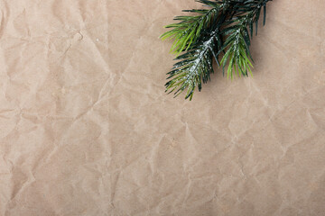 Winter Holiday themed background image on craft wrapping paper. Christmas and New Year message on social media, email and cards. 