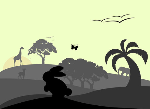 Wild animals in the African sunset background