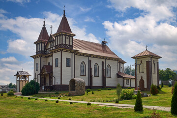Fototapeta na wymiar Ancient church of St George in Polonechka village, Brest region, Belarus. View of the church in summer.