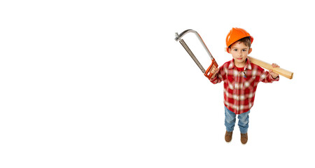 Flyer with funny little boy, kid in image of builder, architect in orange protective helmet posing with tools isolated on white background