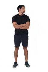 front view of man wearing sportswear, shorts, looking side isolated on white background