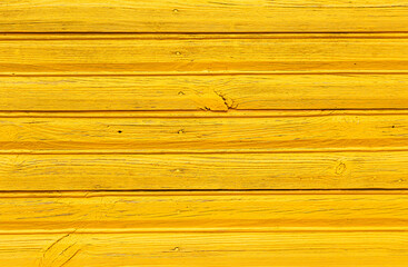 Obraz premium background of wooden boards painted with yellow paint