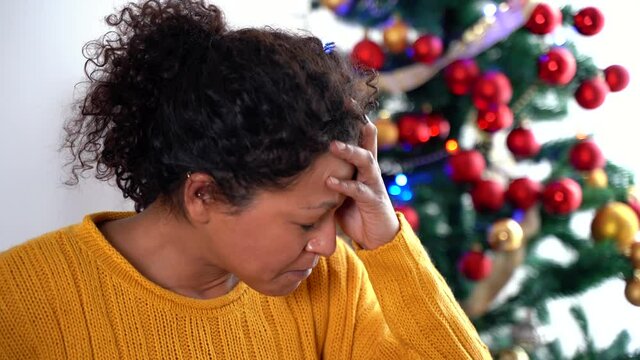 Video about black woman feeling sad and depressed during christmas