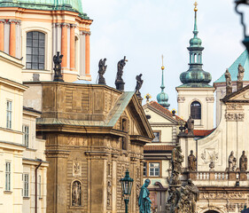 Fototapeta na wymiar Prague, Czech Republic, March 23, 2012. A fragment of a Catholic church with statues in the center of Prague near the Charles Bridge.