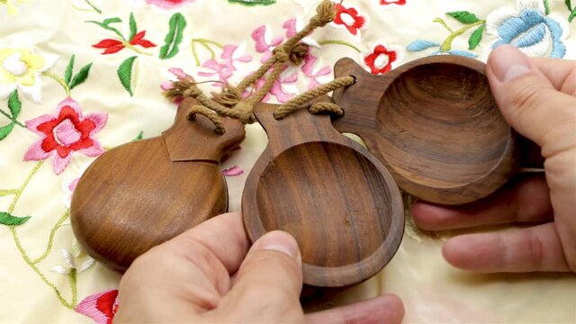 Spanish castanuelas, typical musical instrument of Spanish folklore, typical of the Aragonese jota on white background.