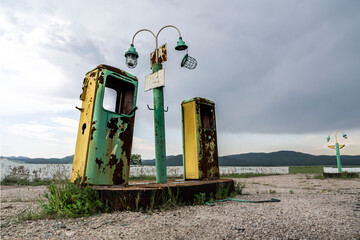 old and abandoned gas station on a forgotten highway, a mystical and gloomy atmospheric place...