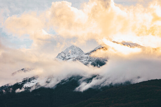 Evening clouds shrouding peaks of Aibga Ridge