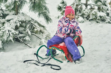 A little girl on a winter walk