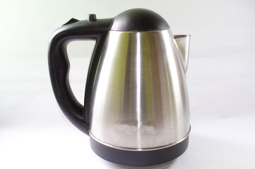 Metal electric kettle with white background.
