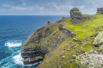 Rock formations on iconic Cliffs of Moher, popular tourist attraction, Wild Atlantic Way, County Clare, Ireland