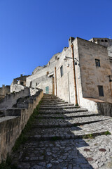 Fototapeta premium A street in Matera, an ancient city built into the rock. It is located in the Basilicata region.