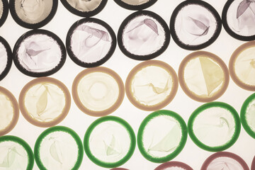 Colorful condoms background.