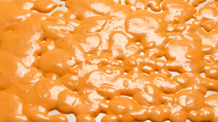 Whipped delicious sauce texture. Hamburger sauce background.